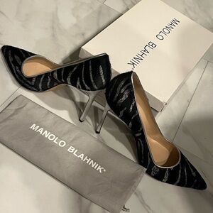Manolo Blahnik 4” black and white silver calf hair.